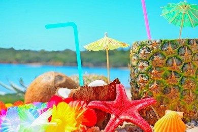 close up of fresh tropical fruits by the sea