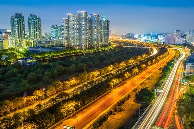 light trails from vehicles on motorway at night singil seoul,korea