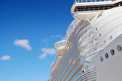 side view of cruise ship on the blue sky background