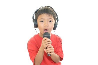 boy singing karaoke
