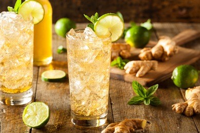 refreshing golden ginger beer with lime and mint