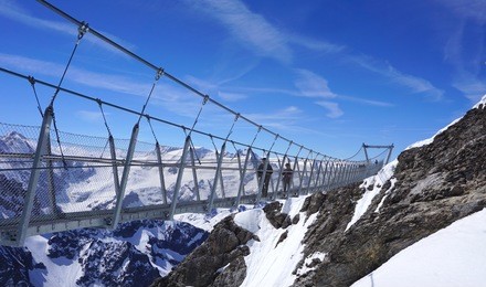 suspended walkway over snow mountains titlis, engelberg, switzerland
