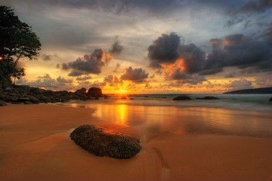 tropical sunset. karon beach. phuket island. kingdom thailand