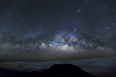 long exposure of the milky way galaxy as seen from the top of the highest mountain on the island of maui. taken from above the cloud line, the sky is crystal clear. 