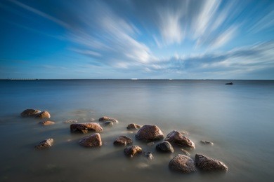 long exposure shot of clouds passing by on gulf of finland near saint - petersburg, russia.
