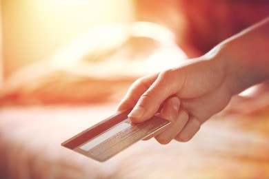 hand holding credit card