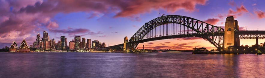 burning bright sunset over sydney cbd cityline pictured panoramic across harbour including skyscrapers and harbour bridge