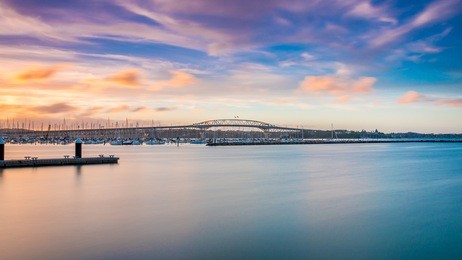 auckland harbour bridge at sunset
