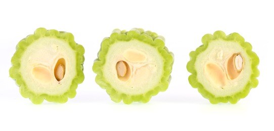 slices of bitter gourd isolated on white background