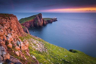 neist point, isle of skye, scotland. neist point lighthouse during a very cloudy day.