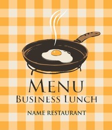 business lunch with a frying pan and fried eggs on the background of a checkered tablecloth