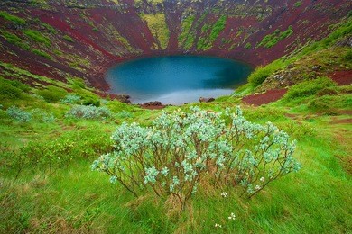 kerid is a beautiful crater lake of a turquoise color located on the south-west of iceland.