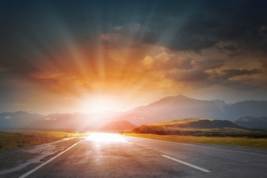 nature landscape of sunset light above asphalt road