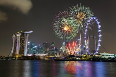 singapore national day fireworks celebration at marina bay cityscape and singapore flyer