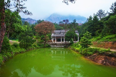 chinese lake with temple and mountain scenery. wenzhou yandang mountain in china
