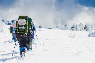 people hiking in beautiful mountain nature landscape