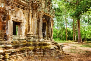 doorway with carving of ancient thommanon temple in amazing angkor, siem reap, cambodia. mysterious thommanon nestled among rainforest. enigmatic angkor is a popular tourist attraction.