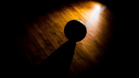 basketball on court with light effect 