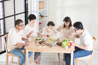 happy asian chinese multi generations family dining at home. 