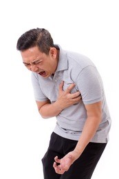 sick man suffering from heart attack