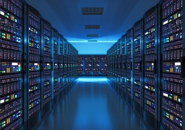 modern web network and internet telecommunication technology, big data storage and cloud computing computer service business concept: server room interior in datacenter in blue light