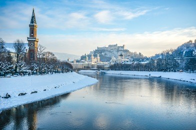 beautiful panoramic view of salzburg skyline with festung hohensalzburg and river salzach in winter, salzburger land, austria