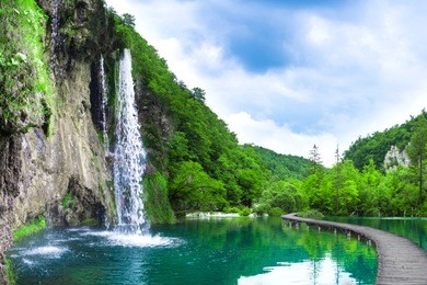 waterfall in mountain lake and green park. croatia.