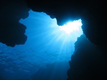 dynamic undersea-scape with sun beam scuba diving in okinawa-aguni island