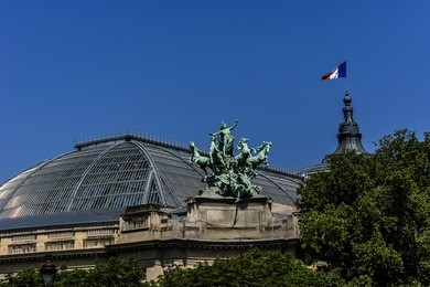 architectural details of grand palais des champs-elysees in paris, france. grand palais in beaux-arts architecture style was built for universal exposition of 1900 and made of glass, iron and steel.