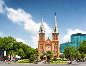 saigon notre-dame cathedral basilica (basilica of our lady of the immaculate conception) on blue sky background in ho chi minh city, vietnam. ho chi minh is a popular tourist destination of asia.