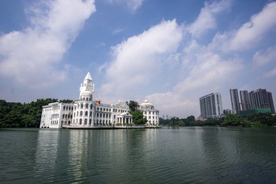 liuhuahu park with the liuhuahu restaurant view on the lake. taken in guangzhou, china.