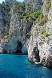 grotto in capri with crystal blue water