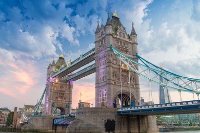 the tower bridge at dusk as seen from st. katharine docks - london