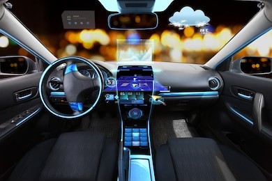 transport, destination and modern technology concept - car salon with navigation system on dashboard and meteo sensor on windshield over night lights background 