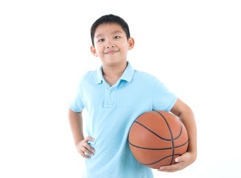 asian kids playing basketball