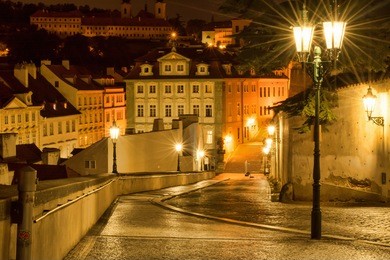 czech republic, prague. 20 august 2015. the street in prague, in the light of lanterns. the capital of the czech republic; the administrative center of the central bohemia region.