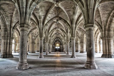 the historic cloisters of glasgow university. dramatic and gritty bleach bypass processing.