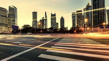 urban city at night with traffic and night skyline