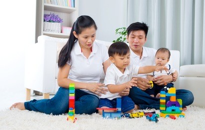 asian family playing toys