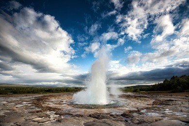 eruption of strokkur geyser in iceland