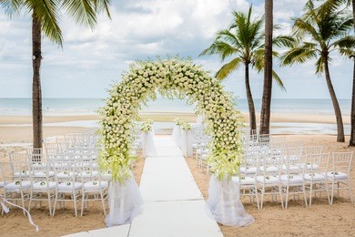 chair setting for wedding on the beach.