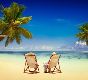 couple relaxing on the beach tourism nature concept