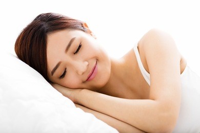 beautiful young  woman  sleep on the bed