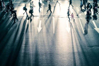 busy city street people on zebra crossing