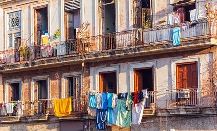 fresh laundry on the balcony of old home, havana, cuba