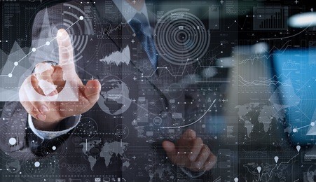 businessman hand working with modern technology and digital layer effect as business strategy concept