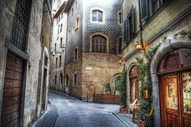 beautiful narrow street in florence, italy