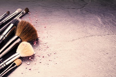 collection of professional makeup brushes