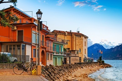 scenic shores of garda lake in brenzone sul garda in evening, italy