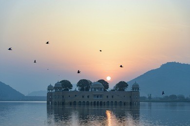 the palace jal mahal at sunrise. jal mahal (water palace) was built during the 18th century in the middle of mansarovar lake. jaipur, rajasthan, india, asia.